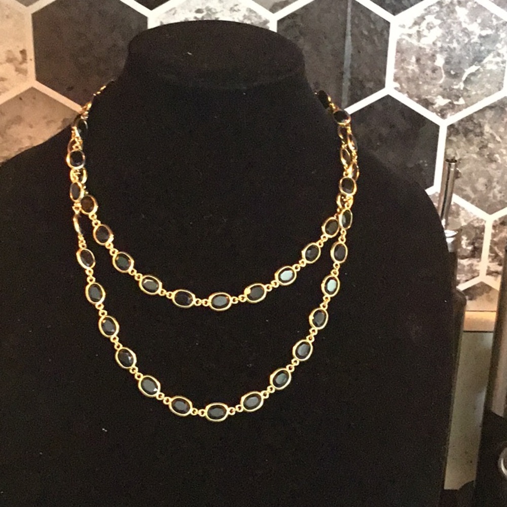 Gold tone with the black accents